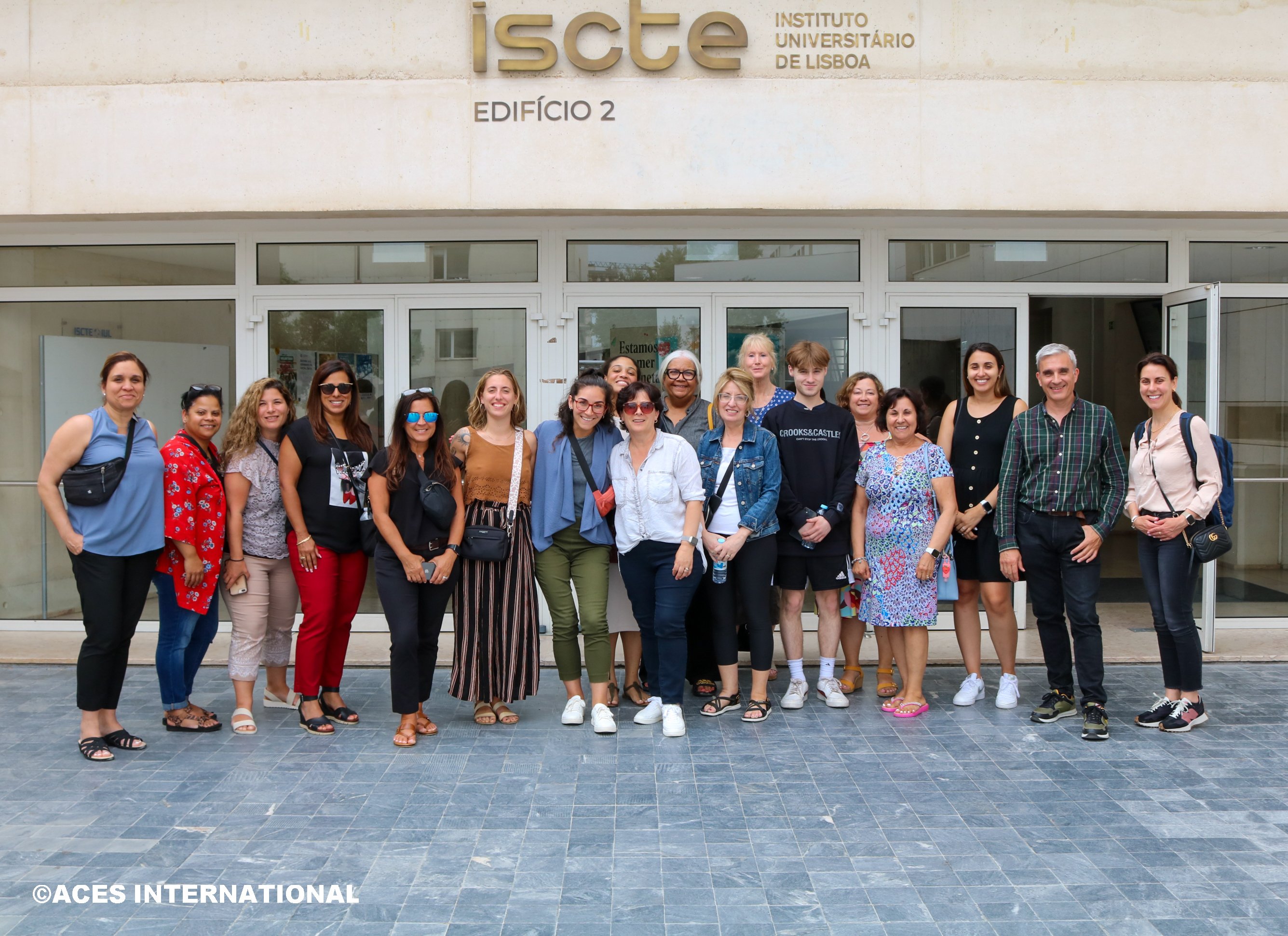 The Educators Field Study group takes a picture in front of the Instituto Universitário de Lisboa.