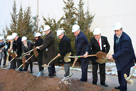 Local officials and ACES board members at the ground breaking ceremony for the ACES campus to be built at 130 Leeder Hill Road in Hamden