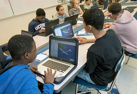 students working on laptops