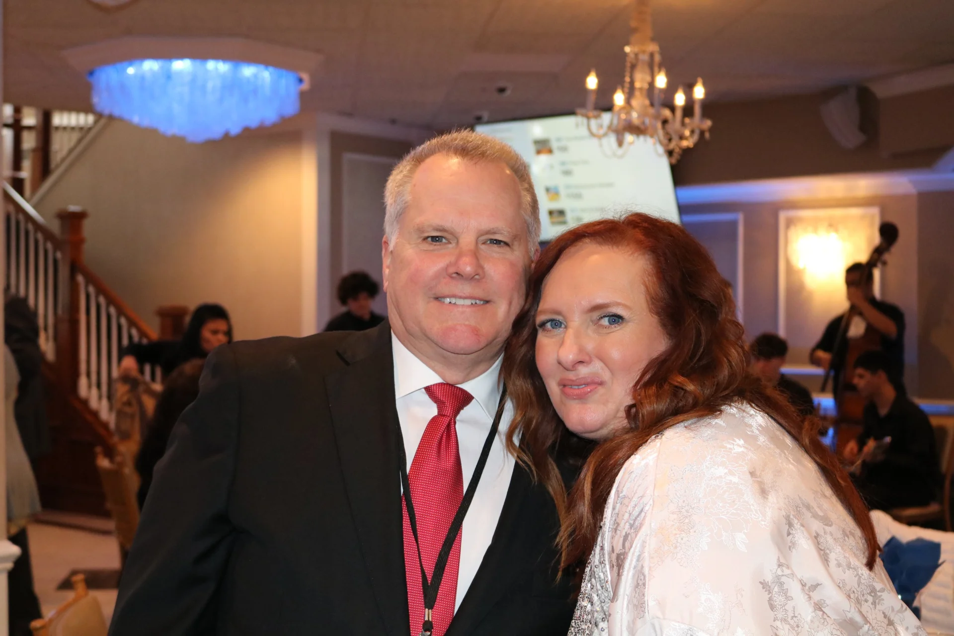 man and woman at the gala smiling