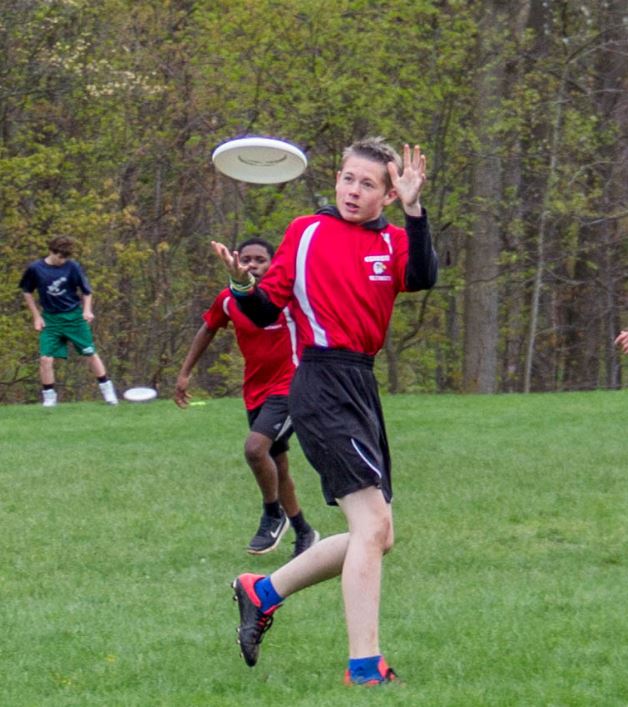 catching frisbee midair